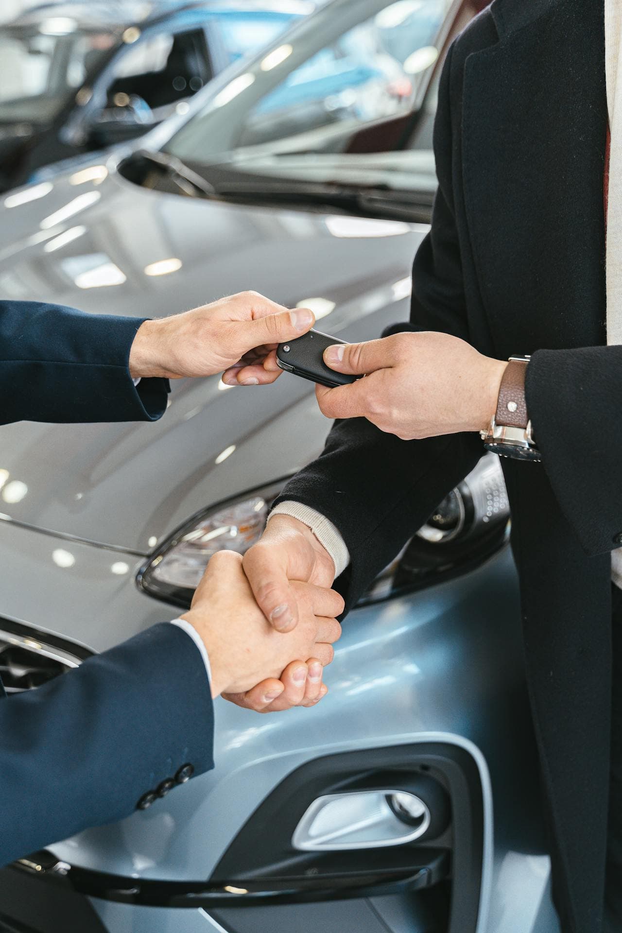 Customer receiving keys while arranging financing